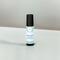 Best Man essential oil roller bottle on a matte white surface against a white wall with a subtle shadow where they meet.